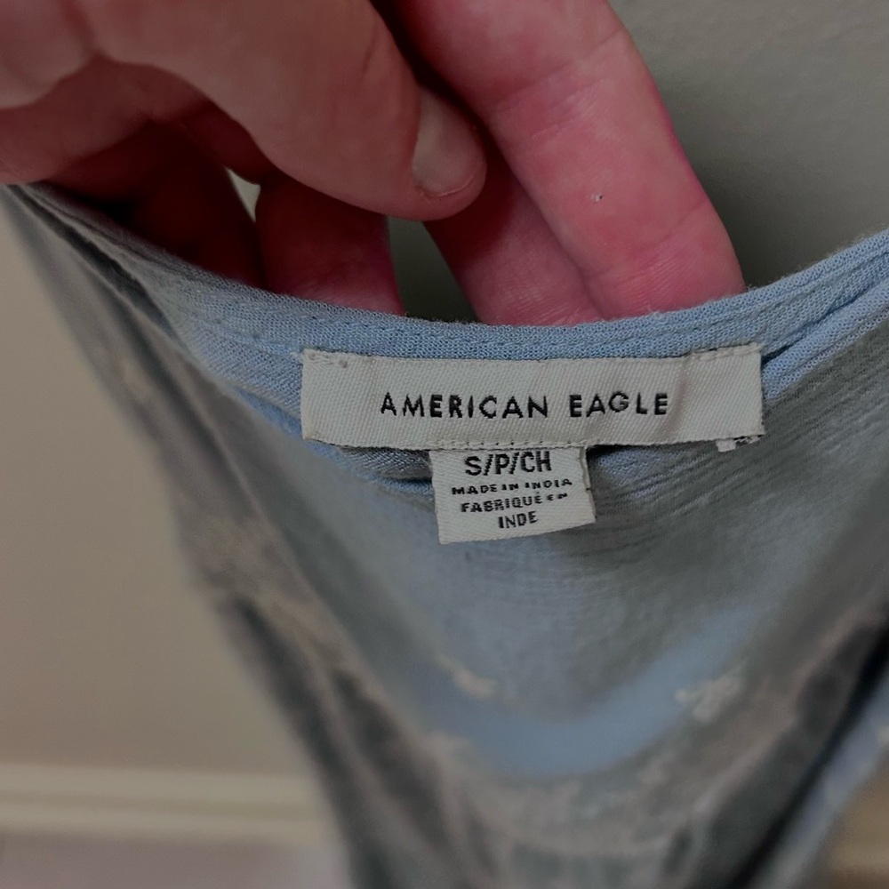 Blue and white embroidered babydoll dress from American eagle